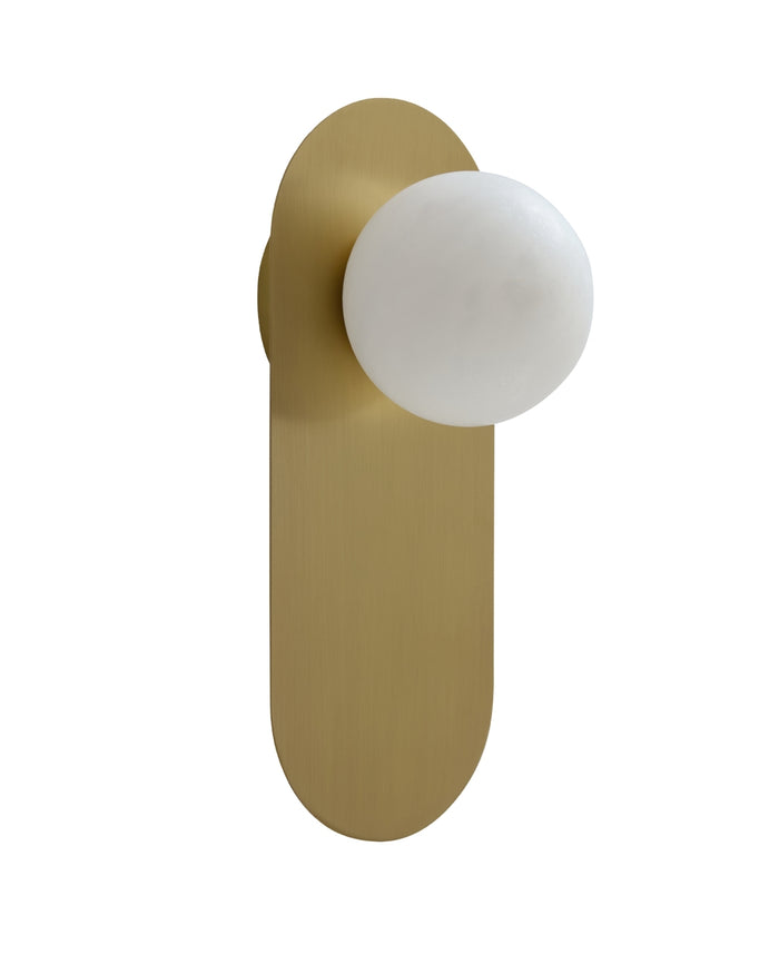 Milan wall sconce shown against a white background, featuring a slim brushed brass vertical backplate with an offset round white glass globe extending outward in a clean, modern silhouette.
