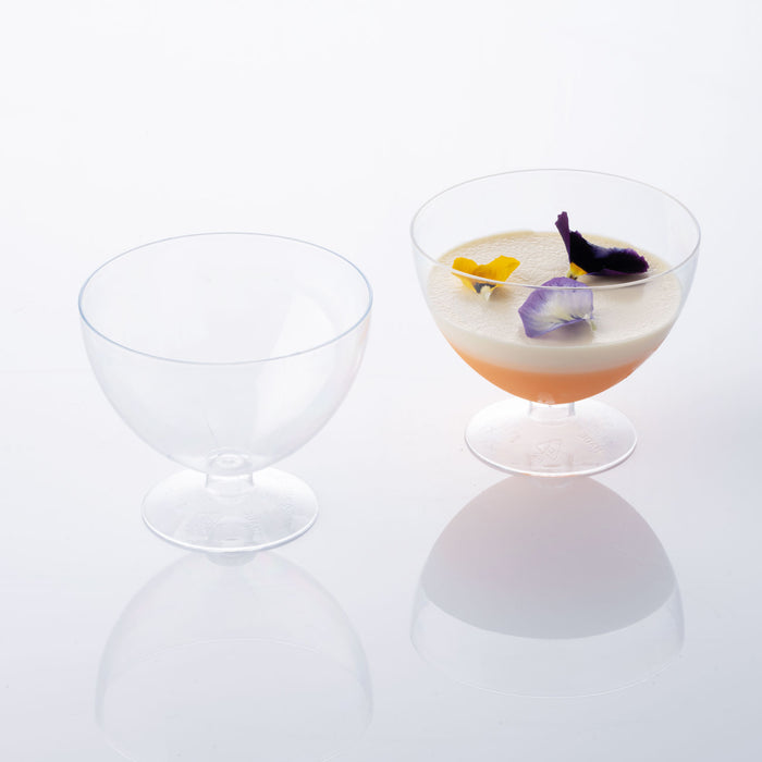 2 Round Goblet Glasses with Base 5.92 oz. showing one empty and one full with liquid shot on white silo background.