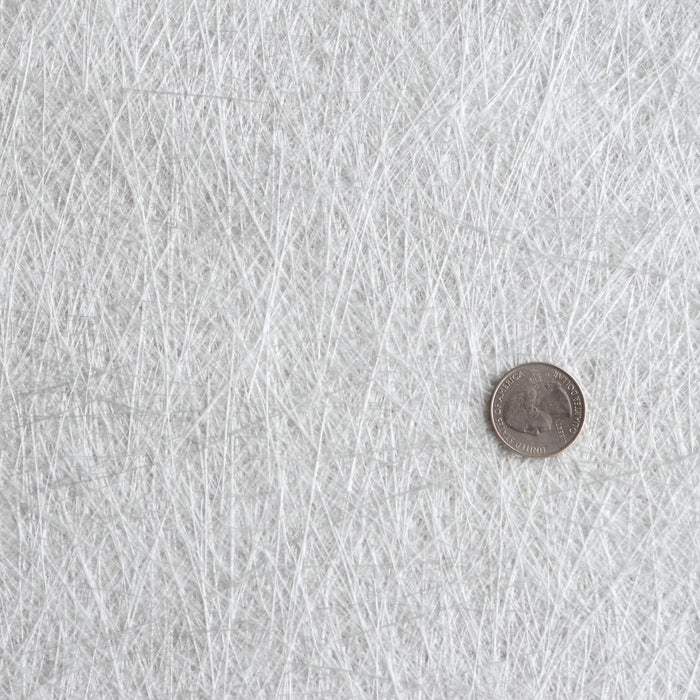 Fiberglass mat made up of short strands of fiberglass.