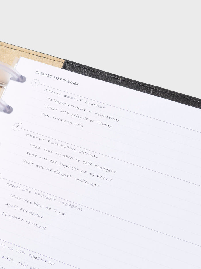 Insert in use inside a black leather folio. Size shown is HP Classic.