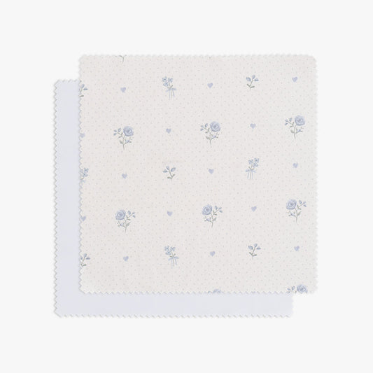 Ditsy Floral patterned swatch with blue flowers on a white background