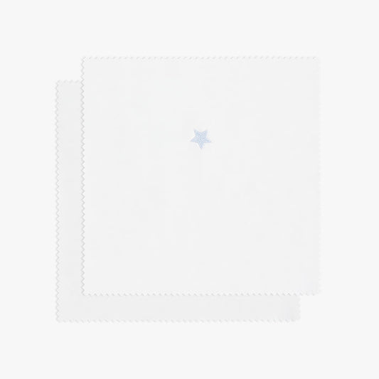 White swatch with blue star embroidery.