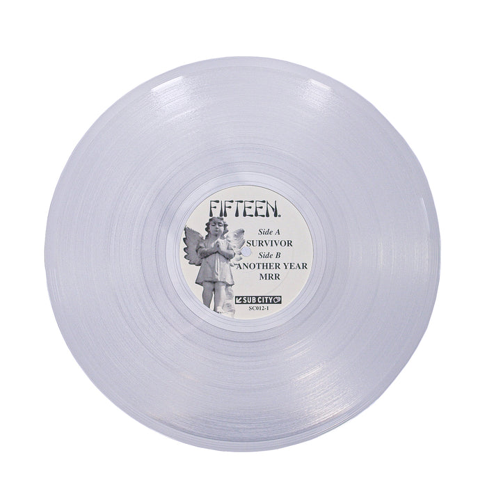A translucent Hush Clear vinyl from Fifteen with a central angel-illustrated label reading FIFTEEN and track names: SURVIVOR, ANOTHER YEAR, and MRR.