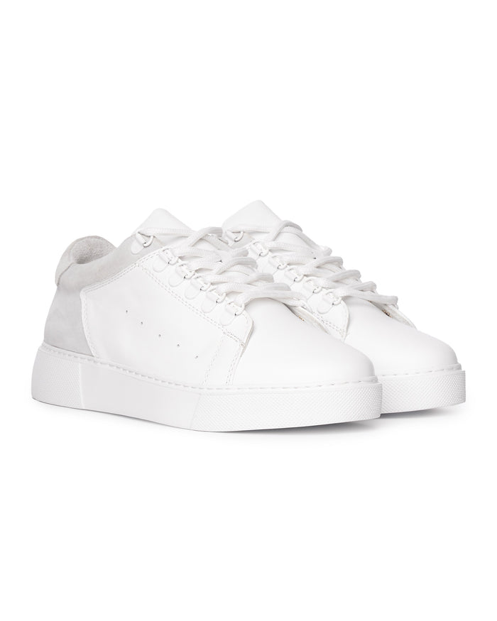 Martin Valen men’s white leather sneakers, three-quarter front view showing laces and chunky platform sole