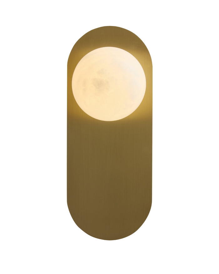 Milan wall sconce on a white background, featuring an elongated brushed brass backplate with a softly illuminated round opaque white glass globe centered near the top.
