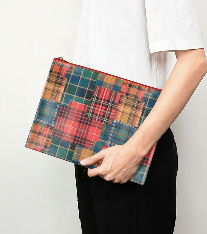 Tartan check zip pouch held by hand, rectangular fabric case
