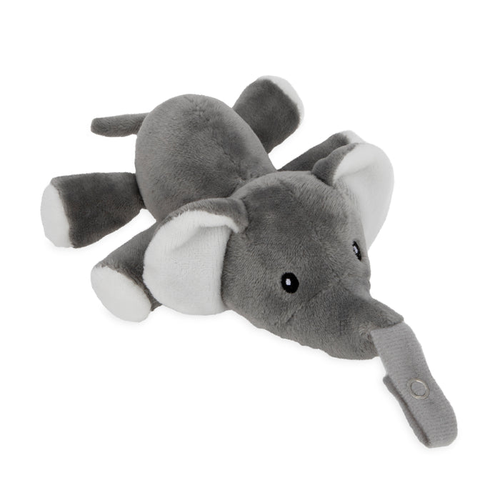 The Snuggleez Pacifier and Clip Combo Set features a soft, gray plush elephant lying on its stomach. Its trunk snaps to hold a natural FLEX pacifier, ideal for soothing babies' gums ages 0-6 months.