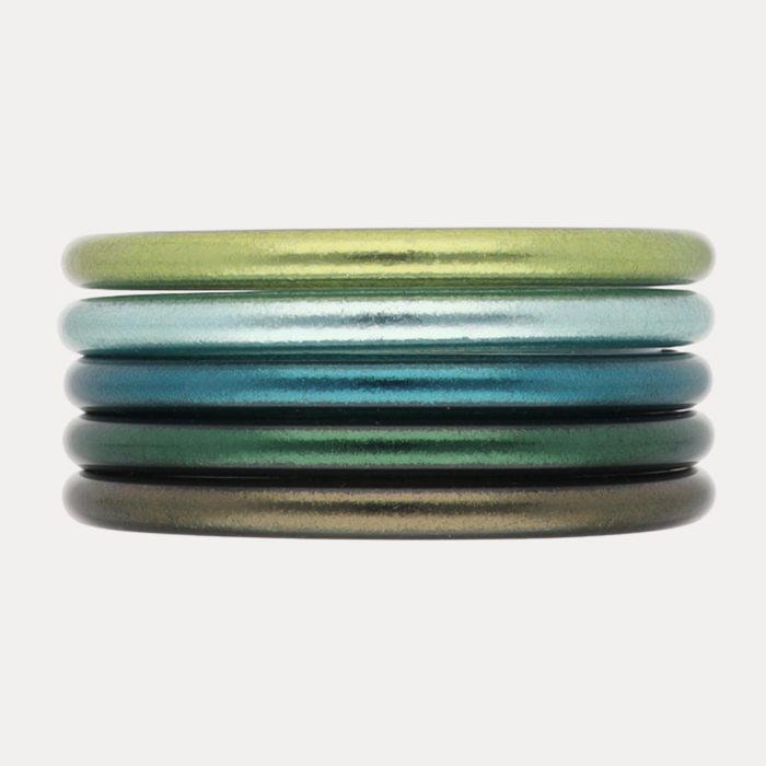 The Twilight Tide Stack bangle bracelet collection in calming coastal gradients of green and blue.