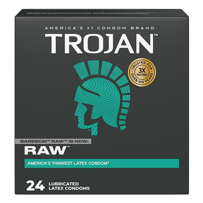 A retail box for Trojan Raw condoms against a clean white background. The upper portion of the black cardboard box features the white "TROJAN" logo below the tagline "AMERICA'S #1 CONDOM BRAND." The center features a stylized Trojan helmet logo in a vibrant teal color, next to a circular gold seal that reads "TRUSTED FOR OVER 100 YEARS • 3X TESTED." A small banner notes "BARESKIN™ RAW™ IS NOW: RAW™" directly above the main product name.