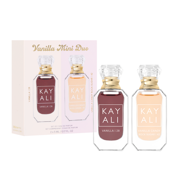 Two perfume bottles with gold caps and 'Kayali' branding, one in red and one in beige, next to their packaging on a white background.